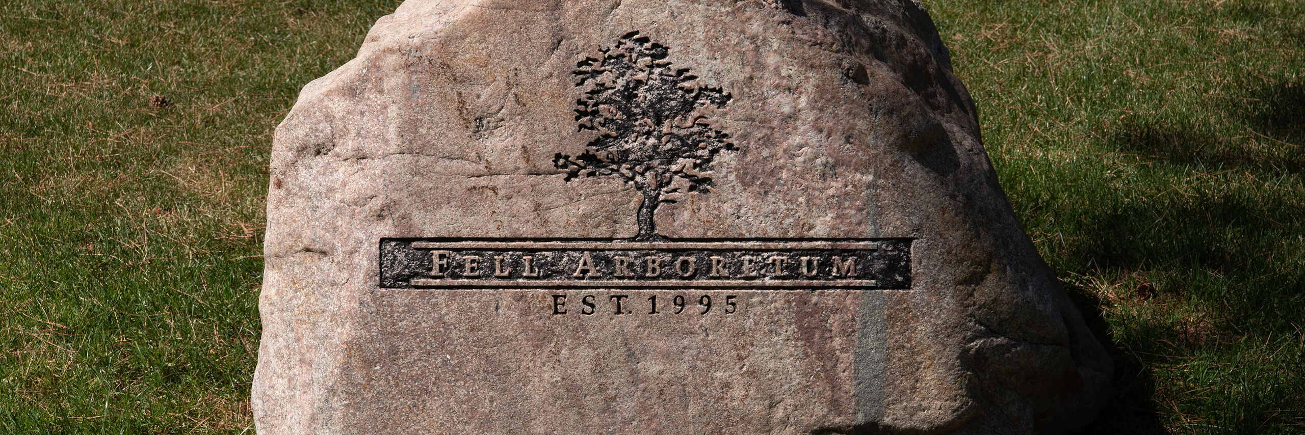 Stone with the Fell Arboretum Logo